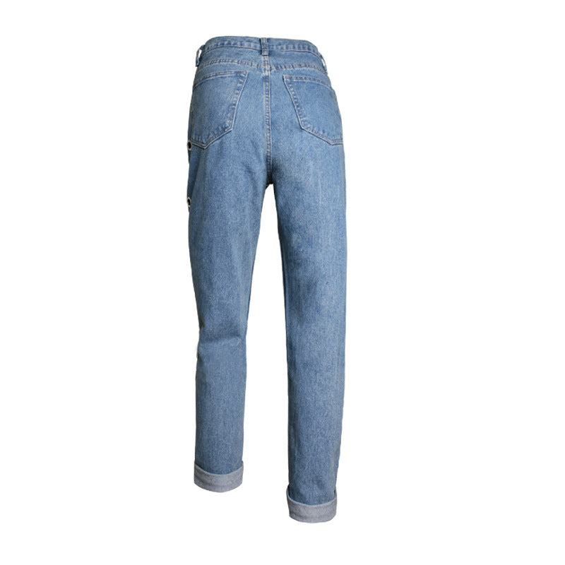 Jean taille haute ample en coton bleu avec rivets et découpes métalliques pour femme
