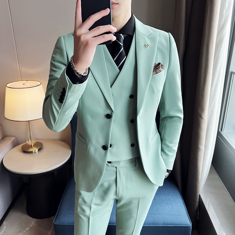 Costume trois pièces coupe slim à double boucle et couleur unie