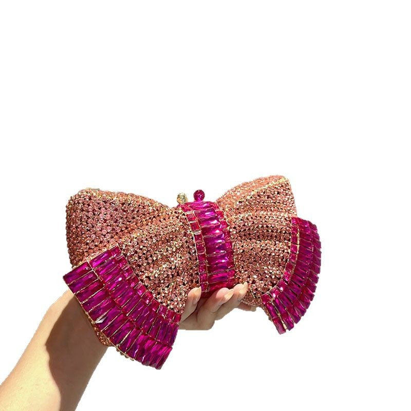Sac bandoulière pochette en métal avec nœud et accents diamantés