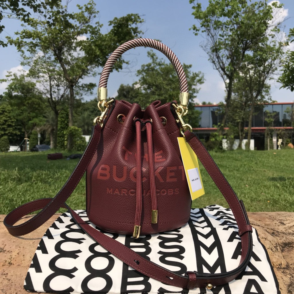 Sac bandoulière en cuir de vachette à cordon de serrage petit sac à main de couleur unie pour femmes