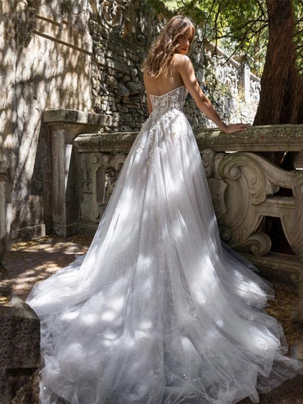 Robe de mariée bustier transparente blanc ivoire pour femme avec fente haute et dentelle