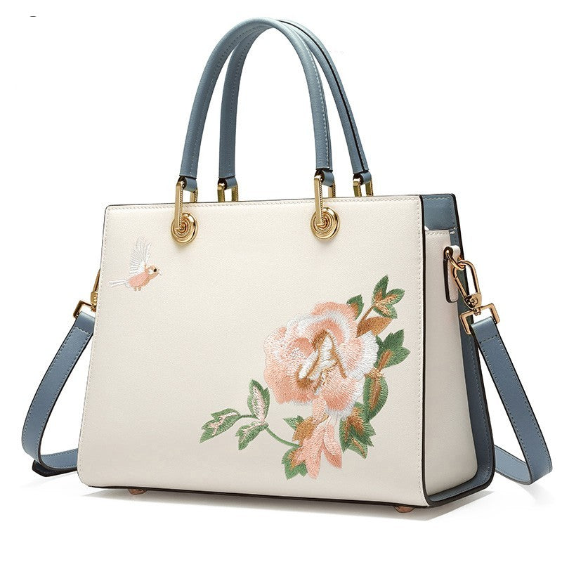 Sac portable brodé en cuir de vachette pour femmes
