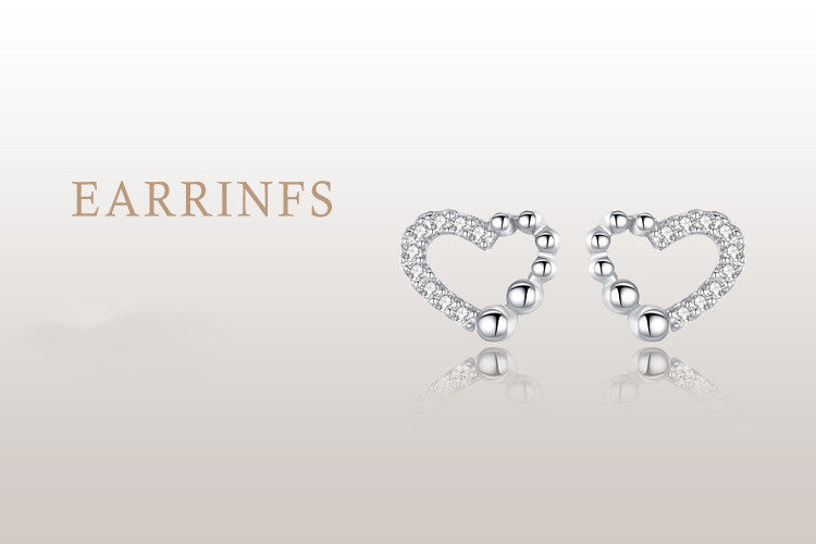Boucles d'oreilles clous en argent 925 avec diamant d'amour