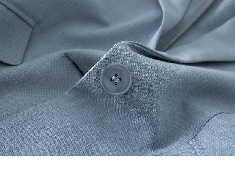 Veste de tailleur femme coupe ajustée avec manches trois-quarts et col de costume