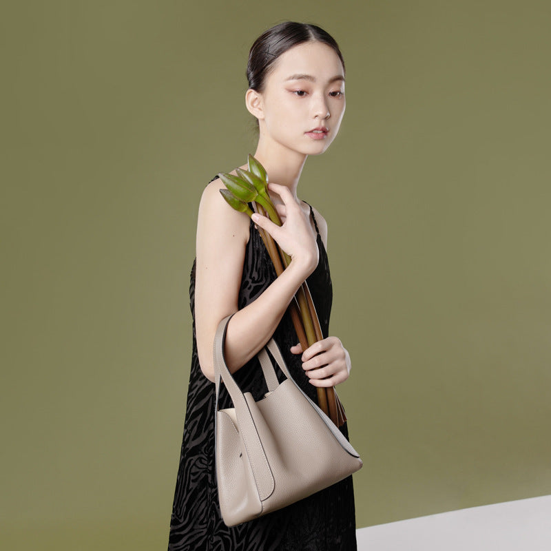 Sac seau en cuir de vachette première couche pour femme, portable pour les trajets quotidiens