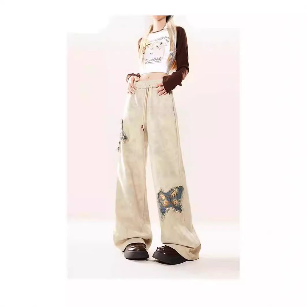 Pantalon en jean évasé abricot brodé papillon américain pour femme