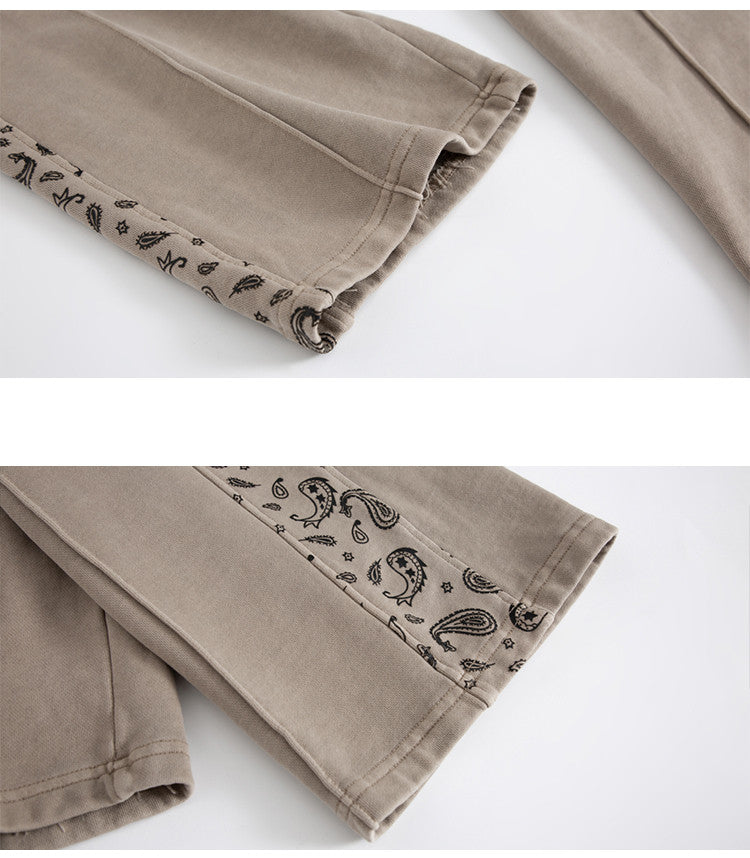 Pantalon à cordon de serrage, effet usé, coupe droite ample, style décontracté.