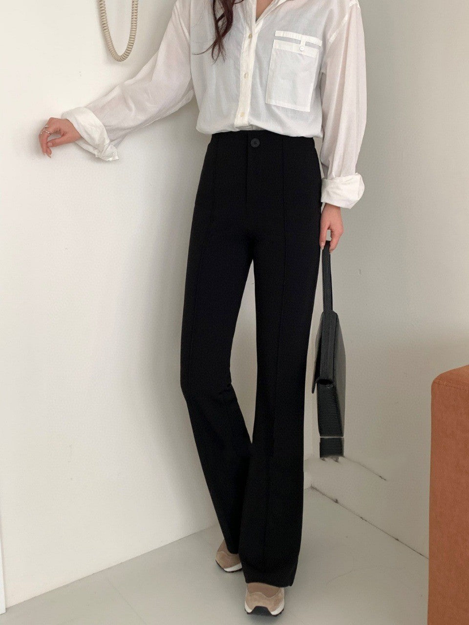 Pantalon décontracté taille haute coupe slim tombant