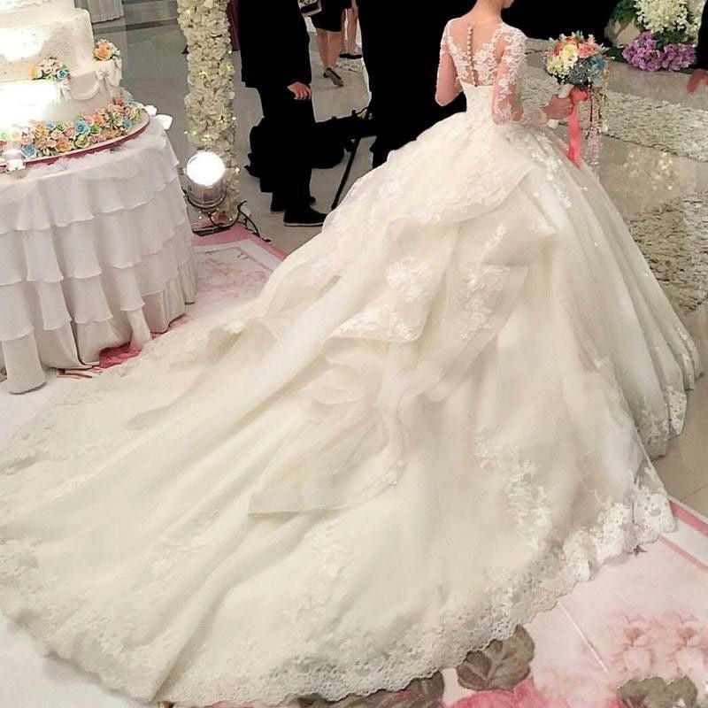 Robe de mariée princesse sexy à manches longues et dos boutonné