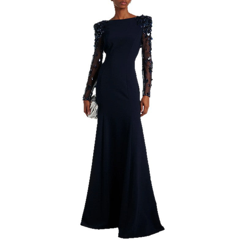 فستان نسائي طويل الأكمام من قماش شبكي مزين بالترتر والخرز والماس