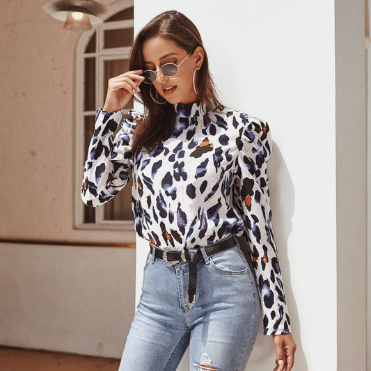 White leopard top with lantern sleeves and high collar