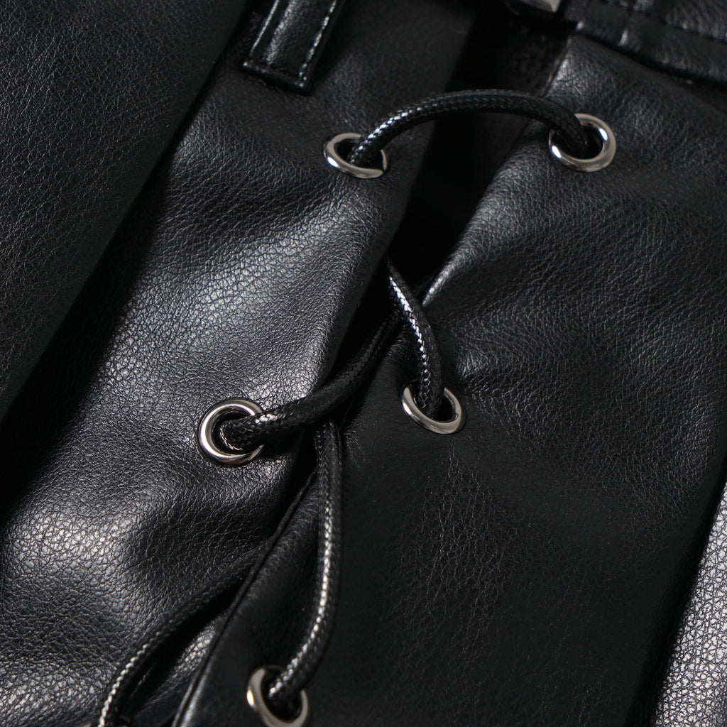 Jupe plissée en nylon noir avec surpiqûres en cuir pour femme