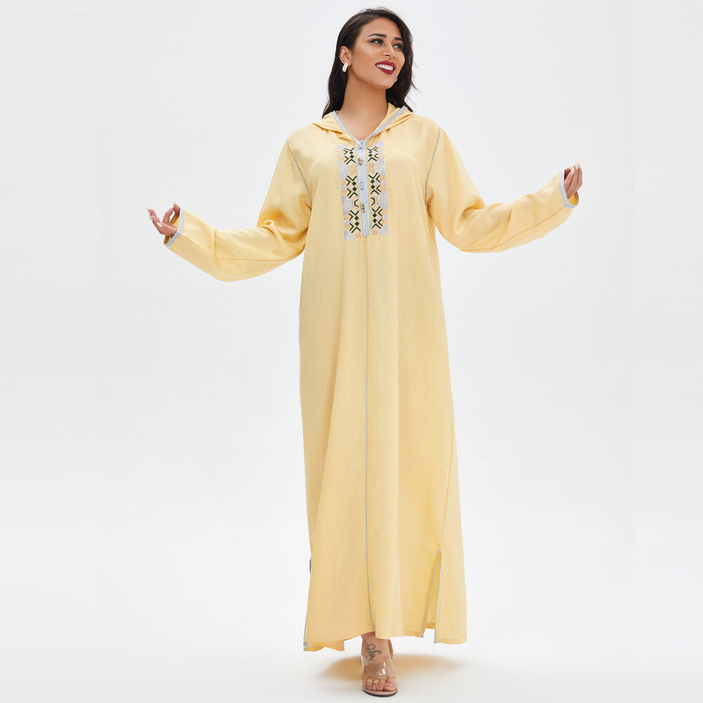 فستان طويل مطرز بتصميم عصري مستوحى من الأزياء المغربية في الشرق الأوسط