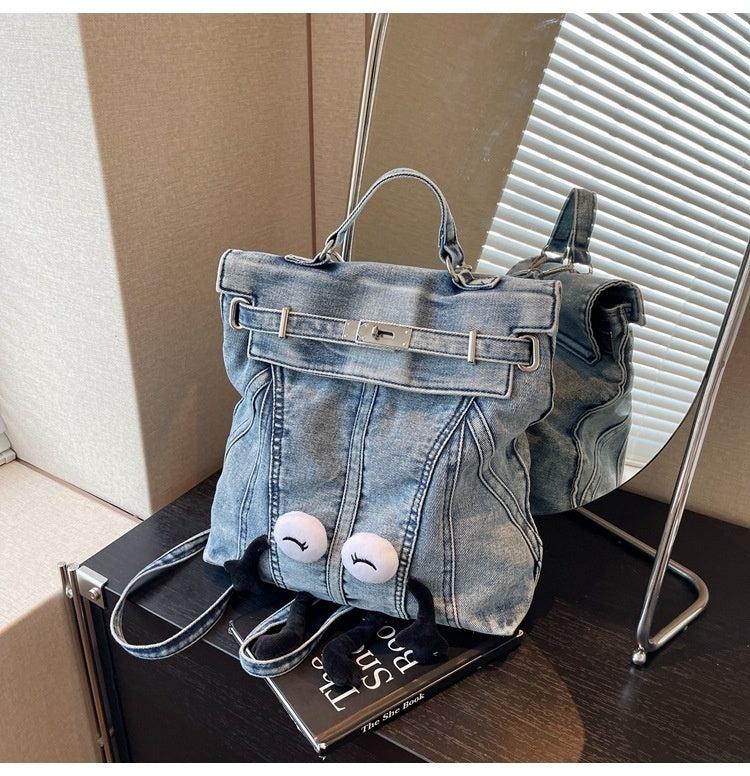 Sac à dos en jean délavé style rétro avec design à la simplicité urbaine