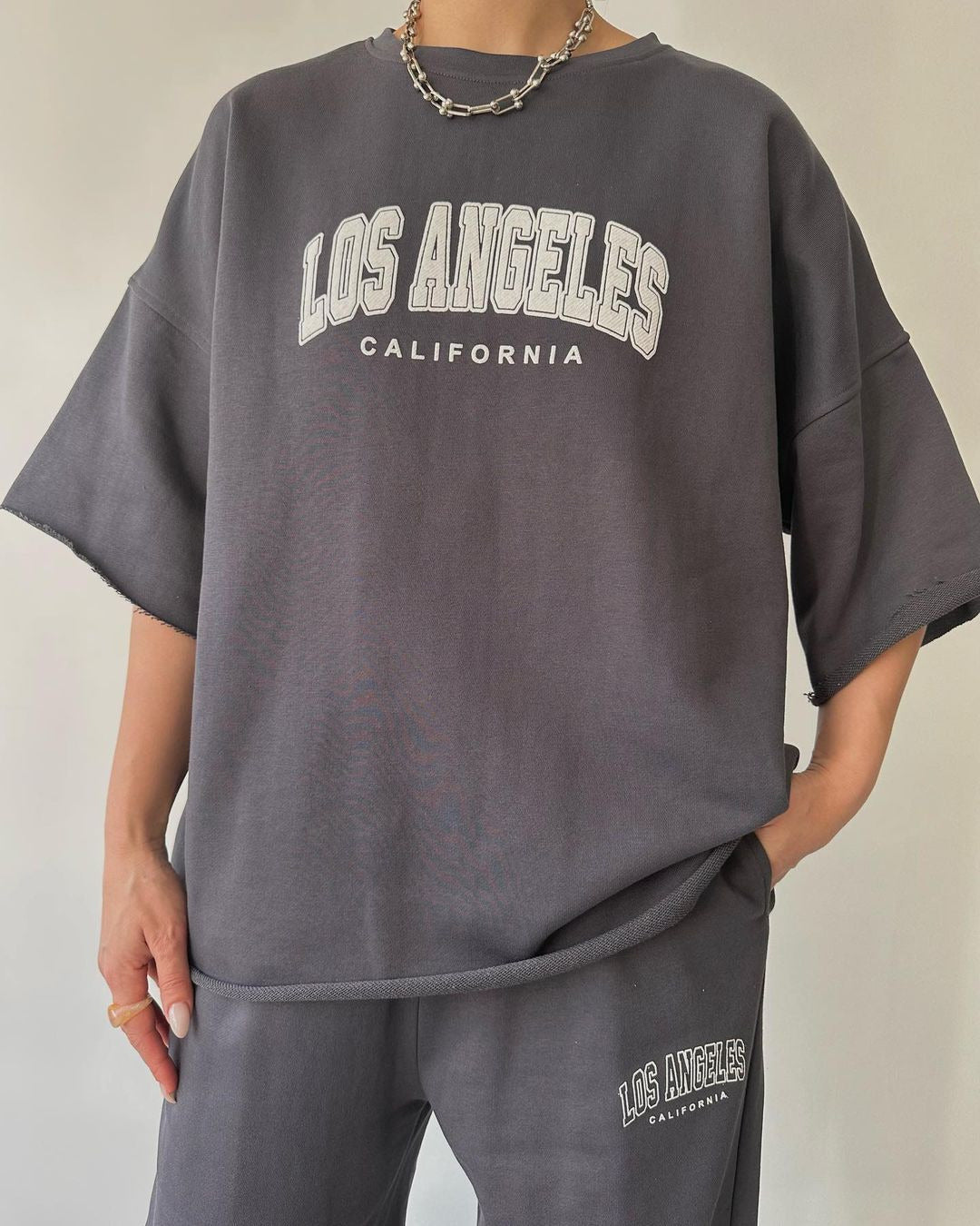 Ensemble deux pièces sweat à capuche imprimé manches courtes et pantalon pour femme