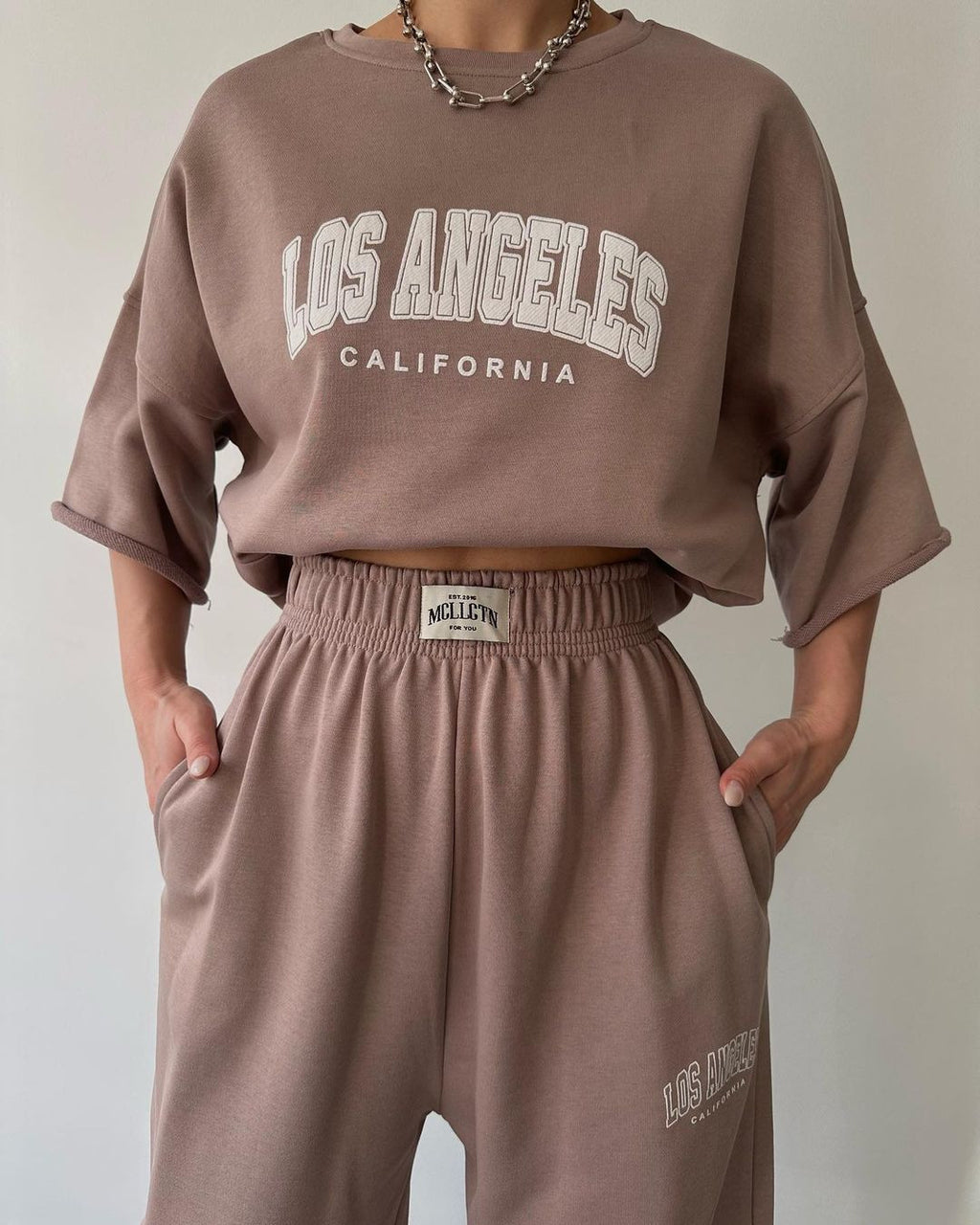 Ensemble deux pièces sweat à capuche imprimé manches courtes et pantalon pour femme