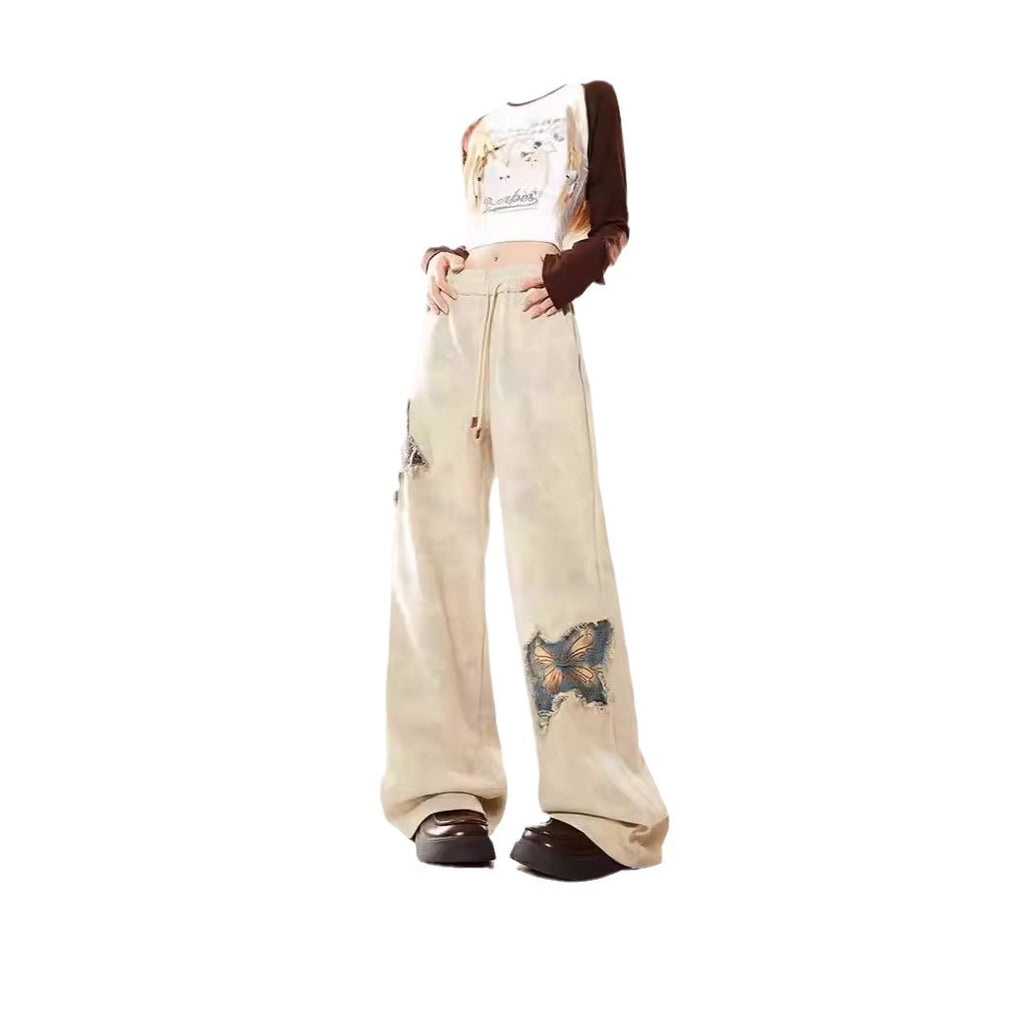 Pantalon en jean évasé abricot brodé papillon américain pour femme