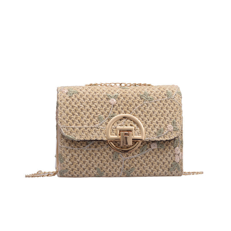Petit sac en paille brodé à bandoulière fine