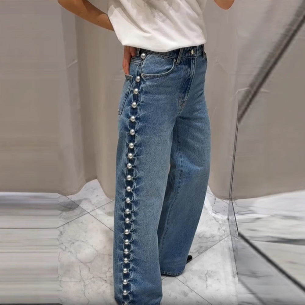 Jeans en jean bleu foncé rétro pour femme avec détails décoratifs de perles rondes sur les côtés