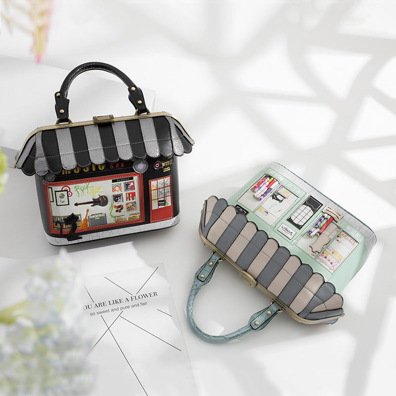 Printed small house handbag
