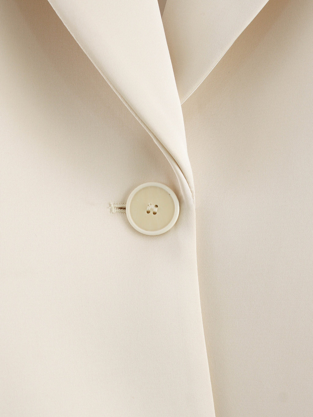 Veste élégante à manches longues en satin de polyester texturé crème