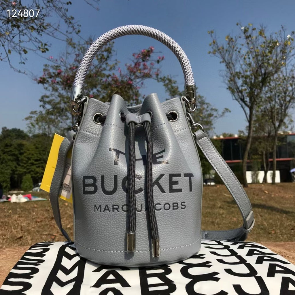 Sac bandoulière en cuir de vachette à cordon de serrage petit sac à main de couleur unie pour femmes