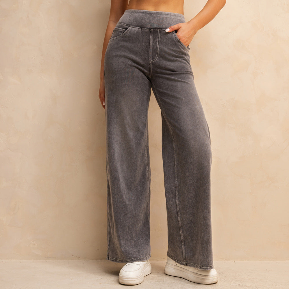 بنطلون جينز نسائي فضفاض بخصر عالٍ ولون رمادي فاتح متوسط