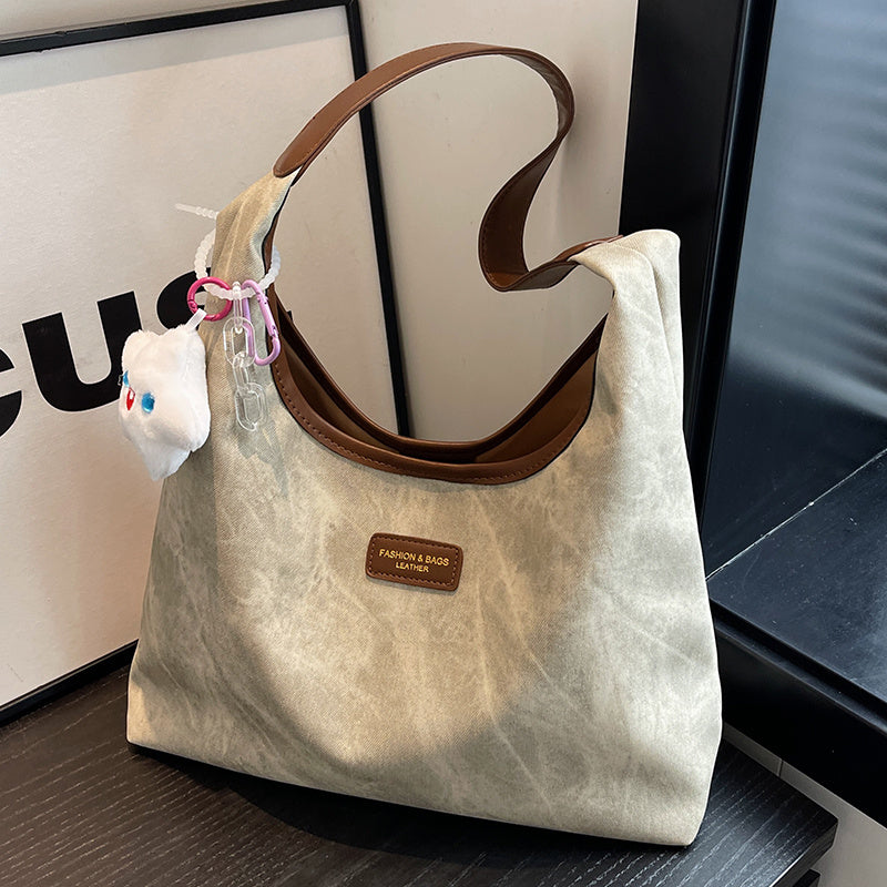 Sac cabas demi-lune en jean et toile avec fermeture éclair