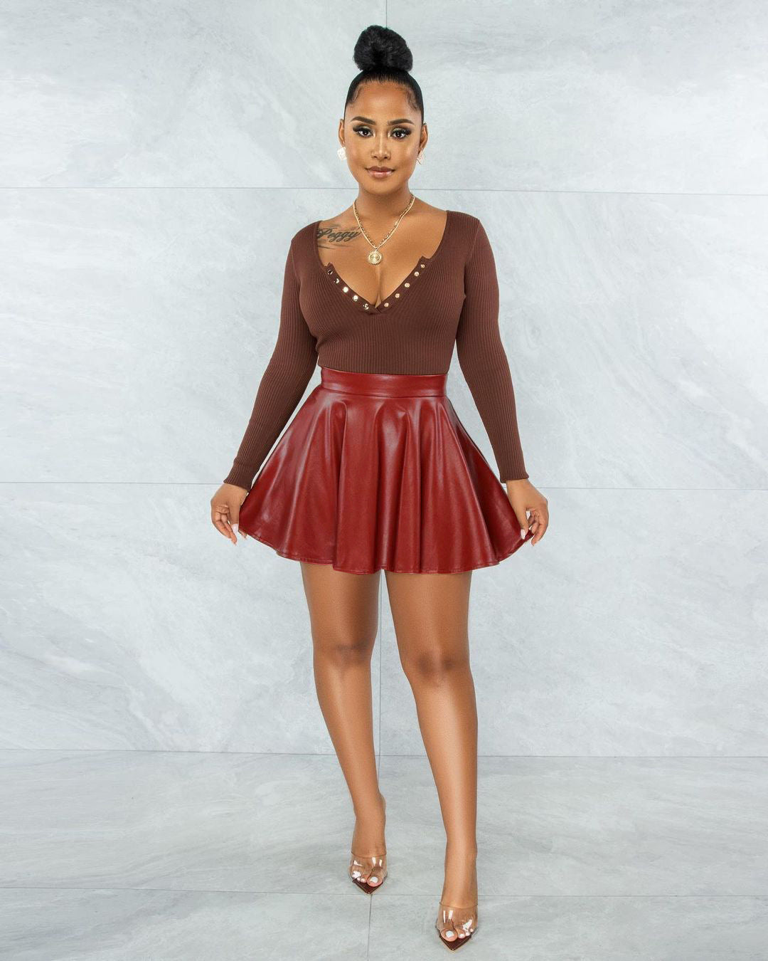 Jupe plissée sexy pour femme en similicuir PU de couleur unie