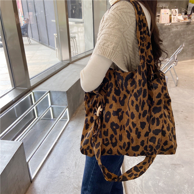 Sac messager rétro grande capacité avec motif rose artistique