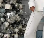 طقم تريكو نسائي بياقة عالية وأكمام طويلة وبنطال