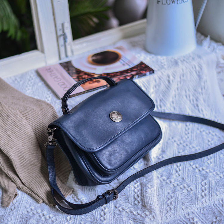 Sac à bandoulière neutre en cuir de vachette avec fermeture éclair