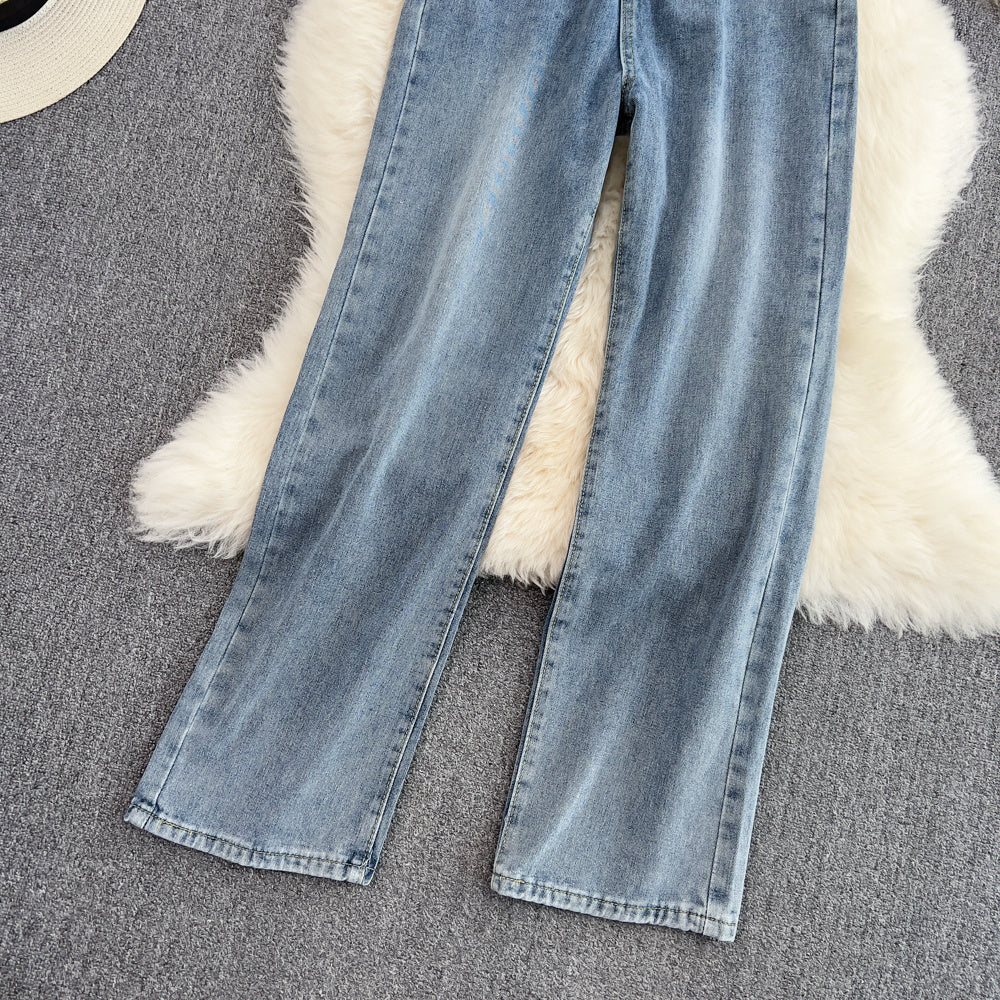 Combinaison salopette sans manches en jean bleu à jambes larges et droites avec poches
