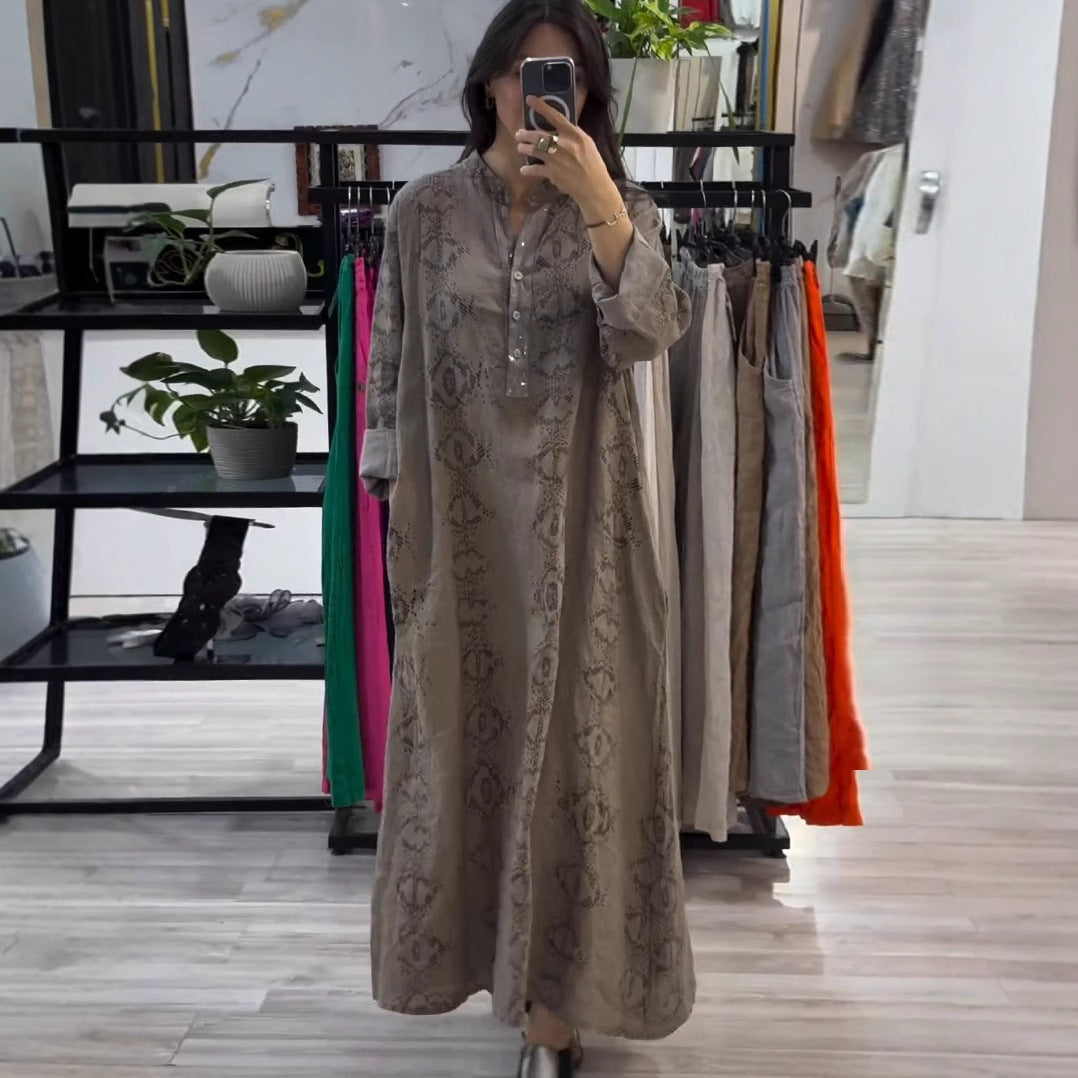 فستان نسائي أنيق بأكمام طويلة ومزيّن بالترقيع