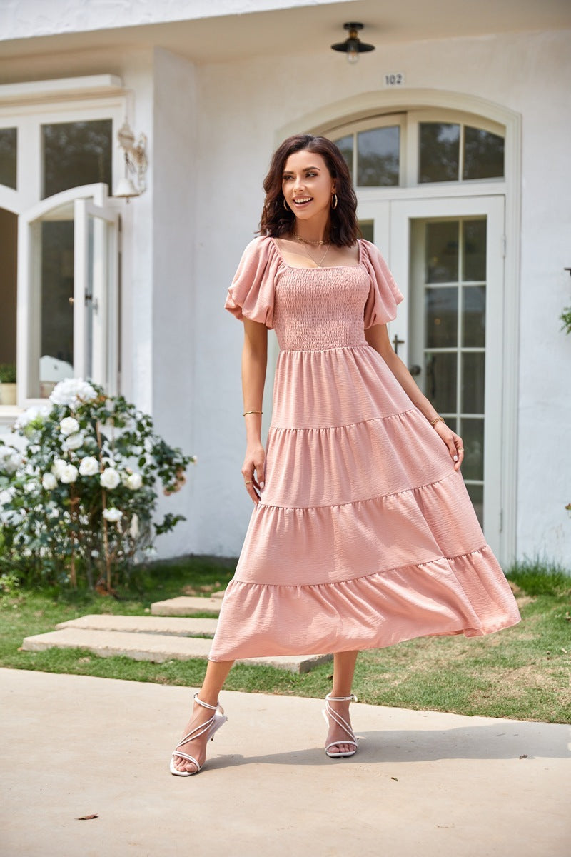 Robe courte plissée à col carré, dos nu et manches bouffantes
