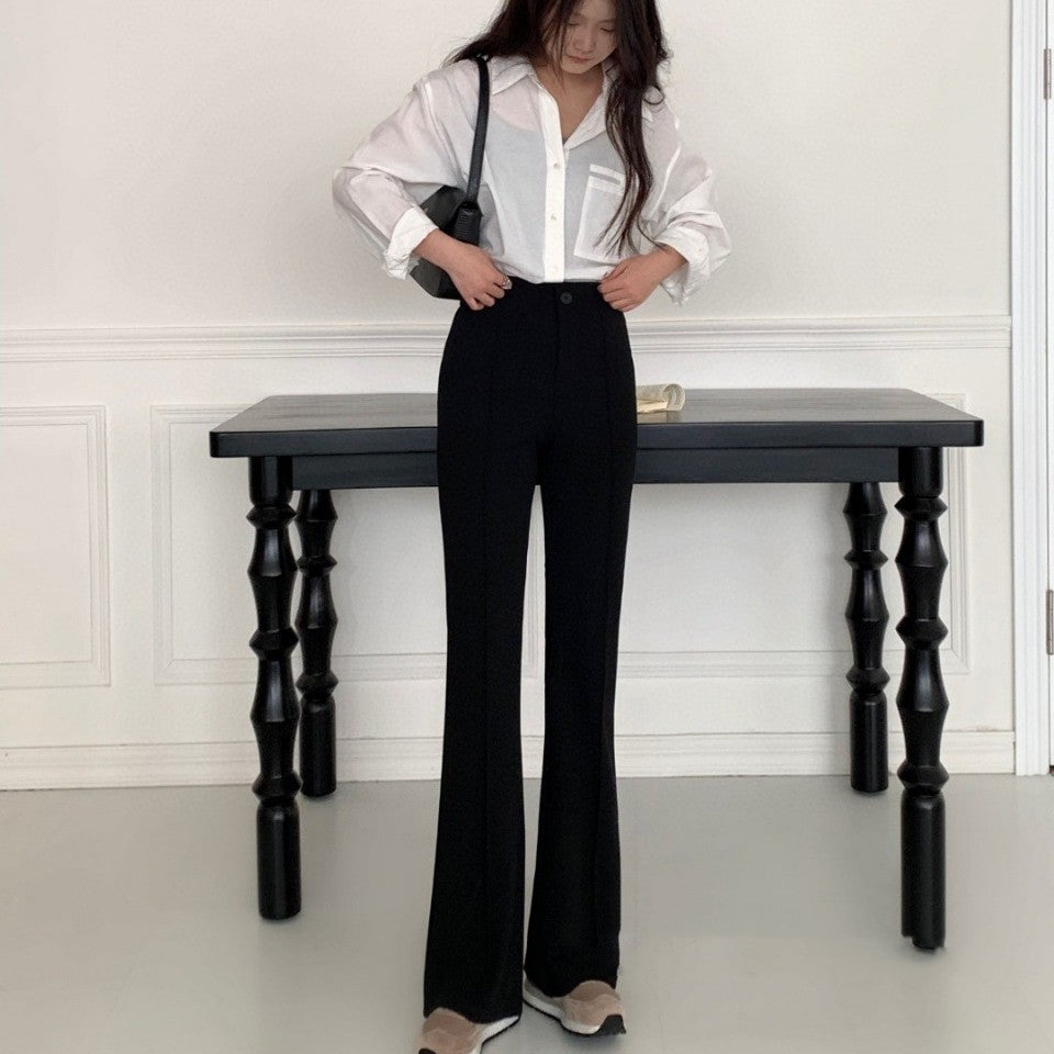 Pantalon décontracté taille haute coupe slim tombant