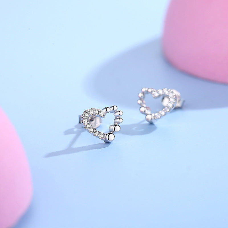 Boucles d'oreilles clous en argent 925 avec diamant d'amour