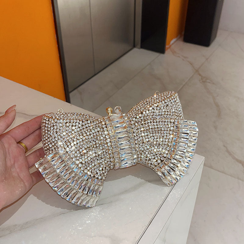 Sac bandoulière pochette en métal avec nœud et accents diamantés