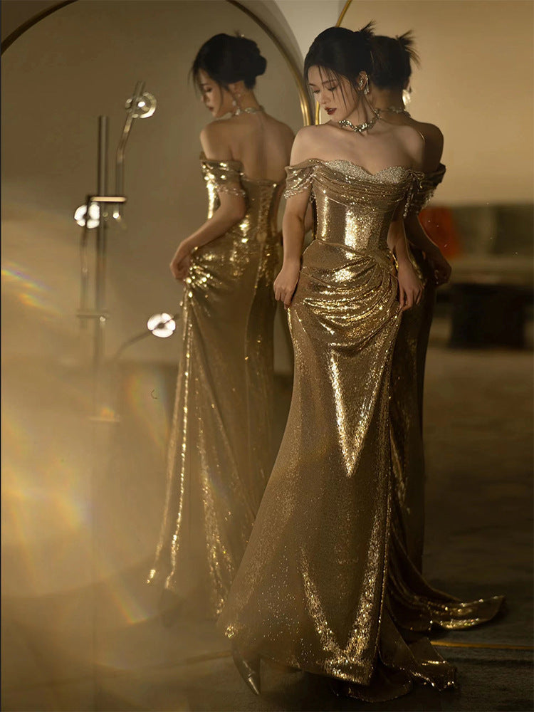 Robe de soirée bustier épaule dénudée pour femme, à sequins dorés