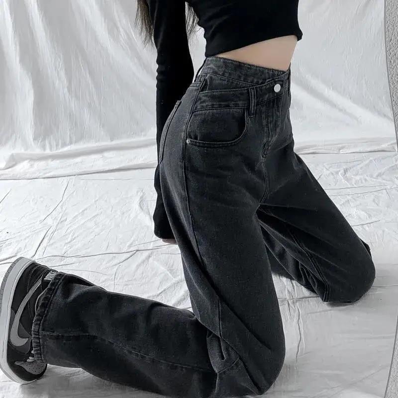 Pantalon en jean coupe droite ajustée avec design irrégulier drapé longueur ras du sol