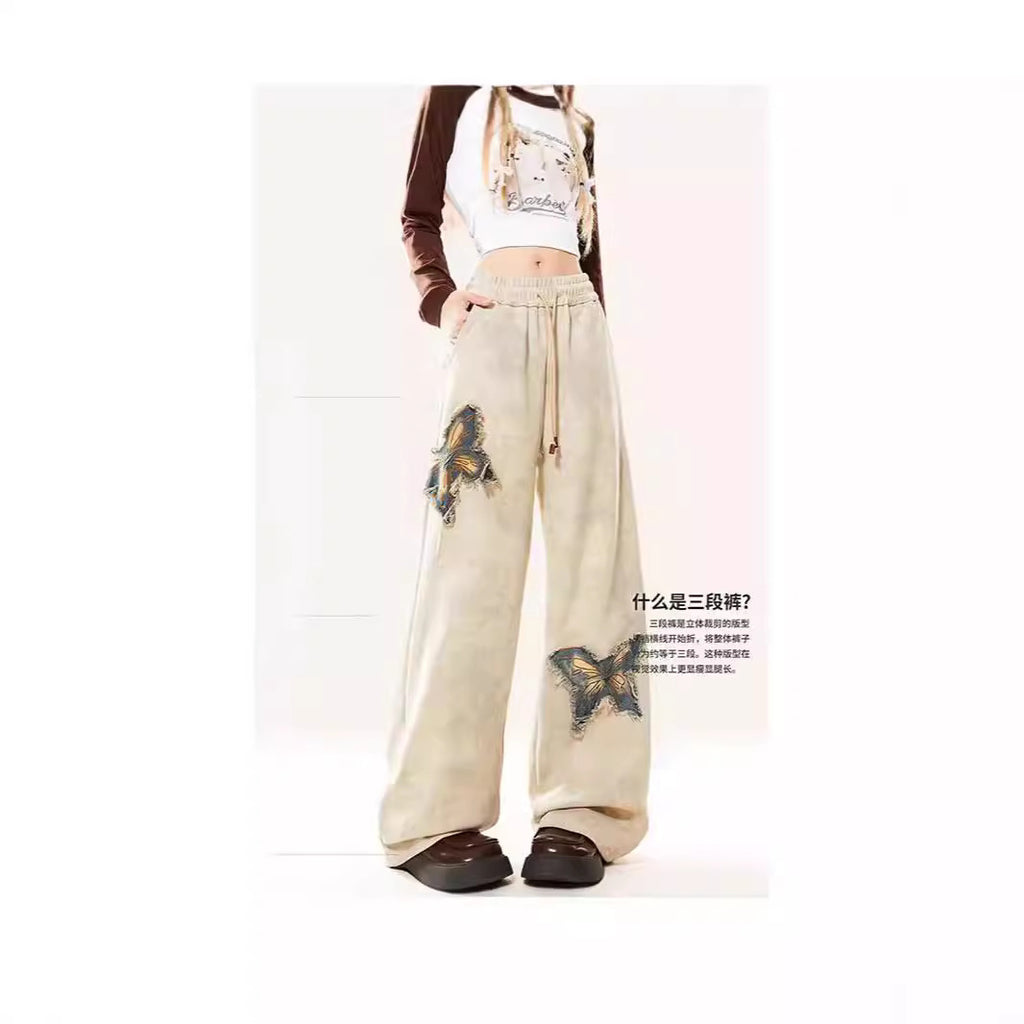 Pantalon en jean évasé abricot brodé papillon américain pour femme