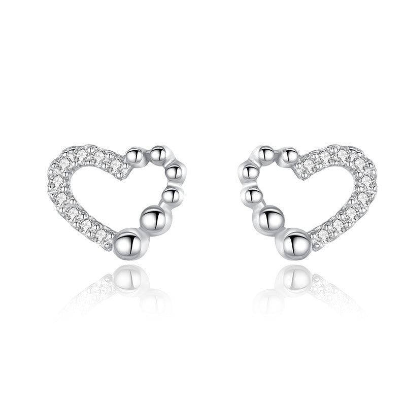 Boucles d'oreilles clous en argent 925 avec diamant d'amour