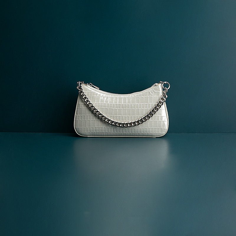 Sac à chaîne en cuir de vachette Baotou petit format, au design original, coloris argent, noir, beige