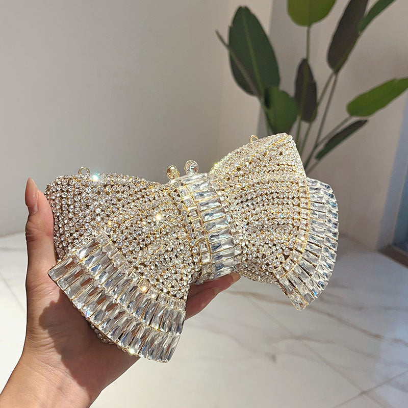 Sac bandoulière pochette en métal avec nœud et accents diamantés