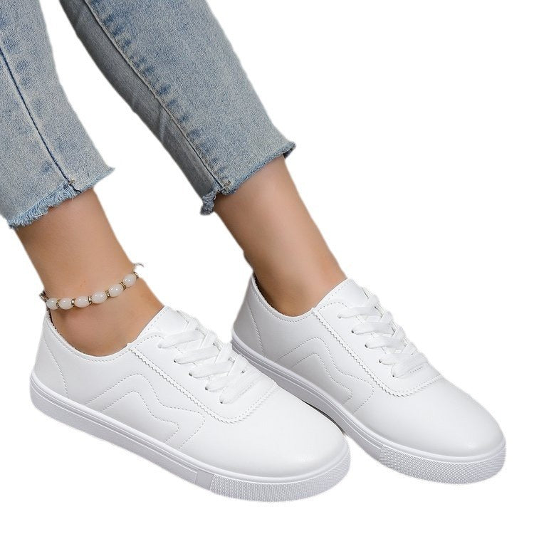 Chaussures plates décontractées à lacets et bout rond blanc