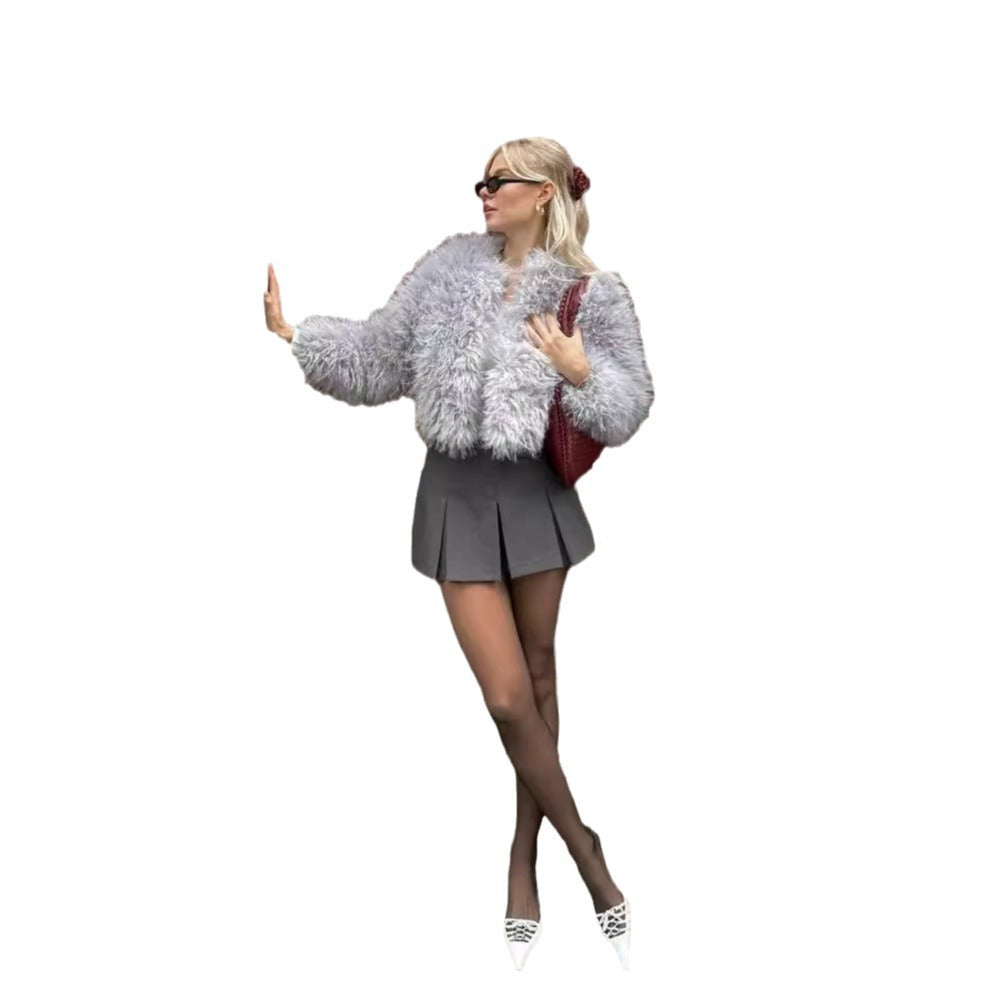 Manteau court en fausse fourrure gris clair à col rond