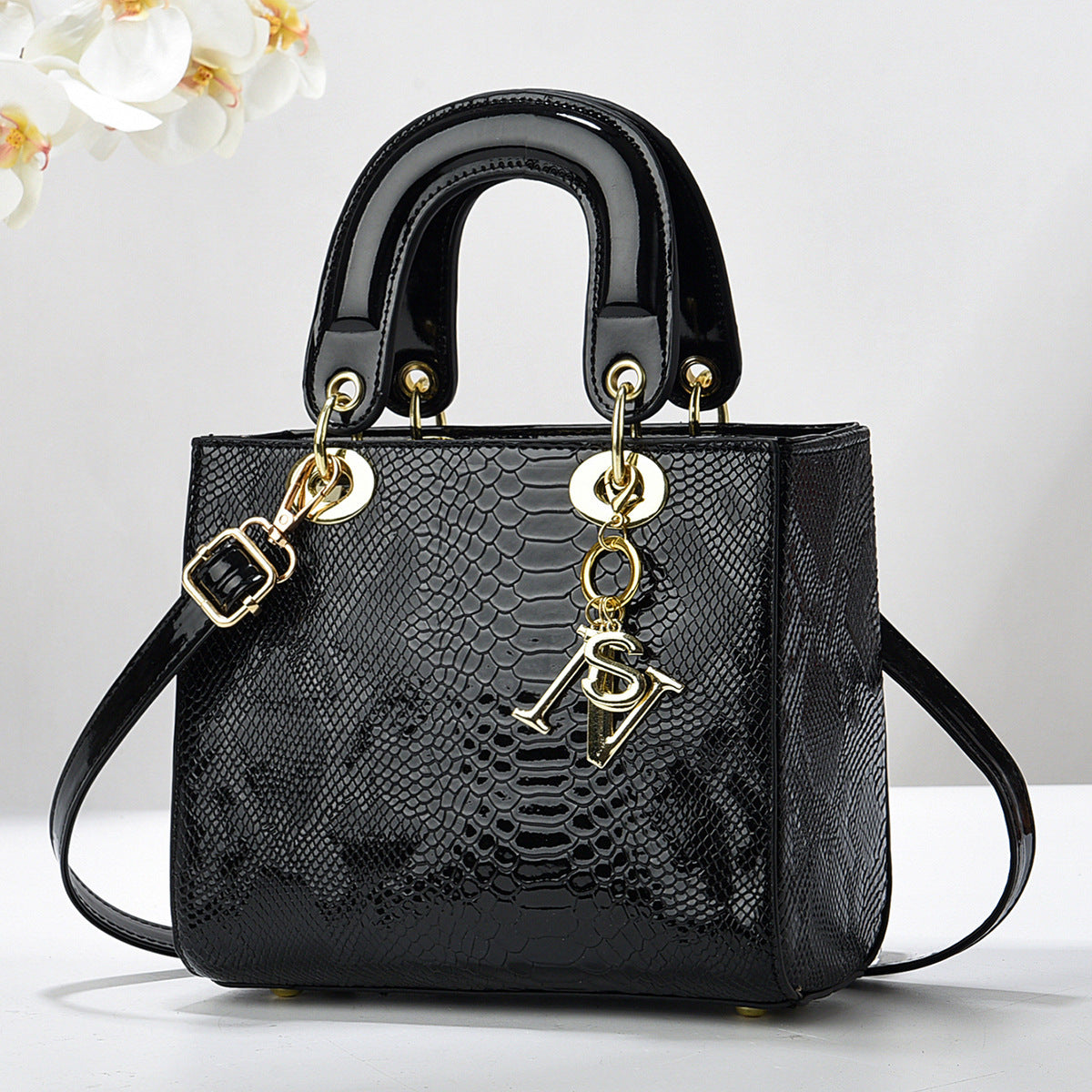 Sac bandoulière en PU pour femme avec motifs peau de serpent et clous