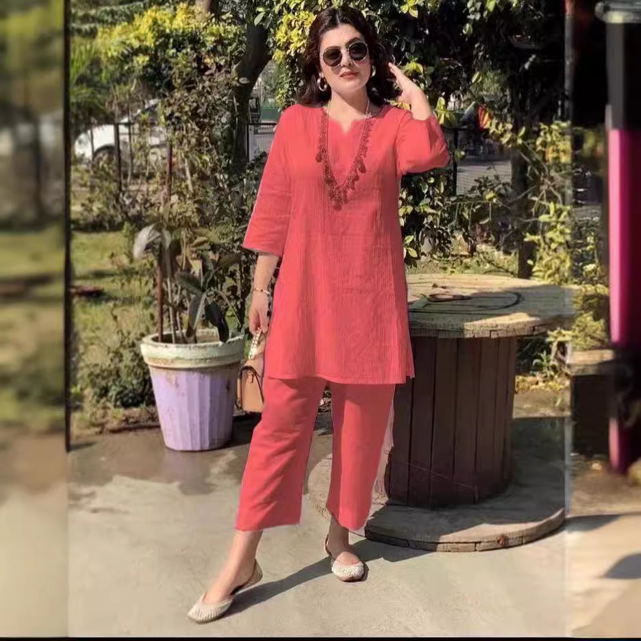 طقم عصري من قطعتين بلوفر بلون سادة وأكمام طويلة بنمط تنقل أنيق