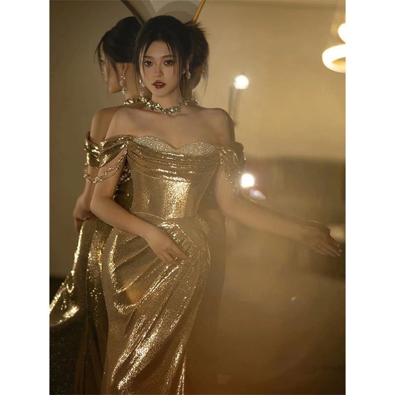 Robe de soirée bustier épaule dénudée pour femme, à sequins dorés