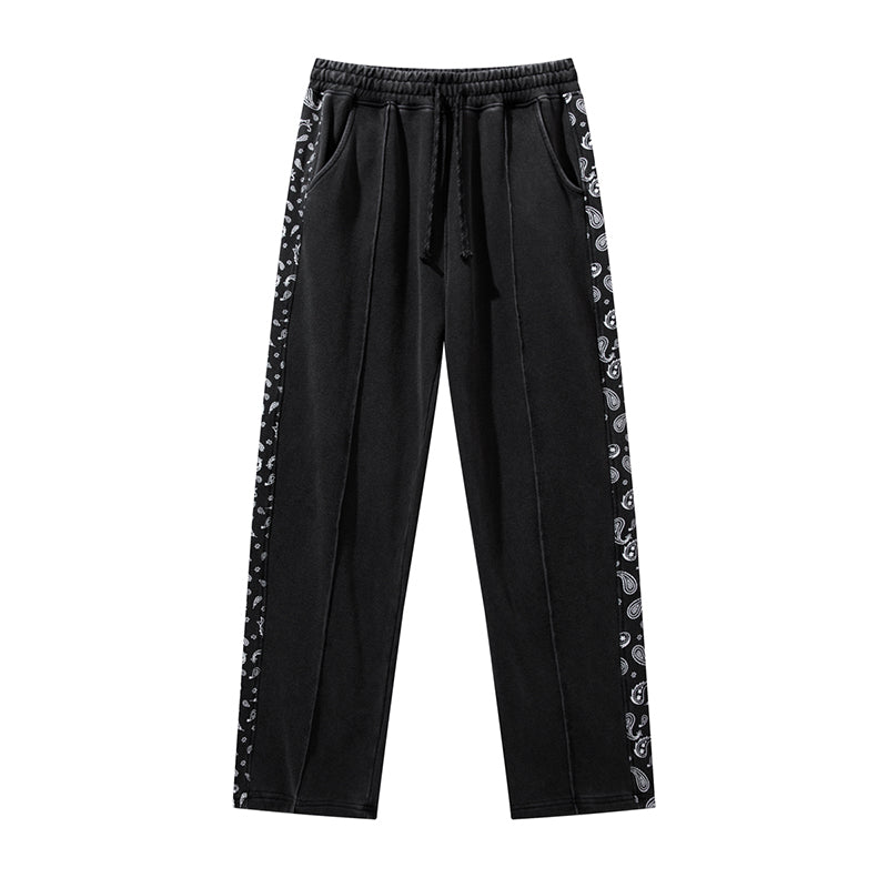 Pantalon à cordon de serrage, effet usé, coupe droite ample, style décontracté.